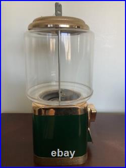 Coin operated gum ball machine, green & gold, quarter, Silent Sales Force, used
