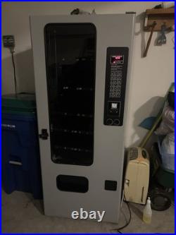 Grey snack vending machine