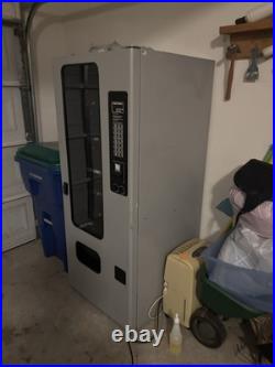 Grey snack vending machine