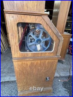 The Penny Press Penny Pincher Souvenir Coin Machine with Wooden Cabinet