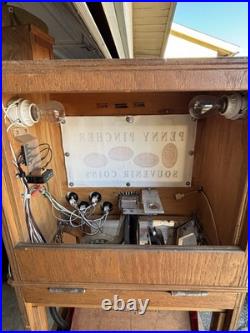 The Penny Press Penny Pincher Souvenir Coin Machine with Wooden Cabinet