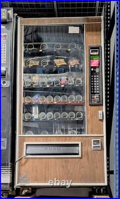 Used USI 2098 Snack Vending Machine 4-Wide Clean, Tested Used USI 2098 Snack Vending Machine 4-Wide Clean, Tested